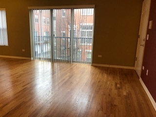 343 East 25th Place, Unit 18B Chicago, IL 60616 - Photo 12 of 12 a view of a room with wooden floor