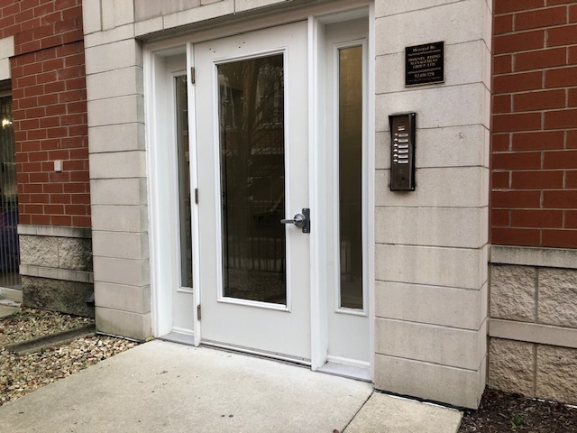 343 East 25th Place, Unit 18B Chicago, IL 60616 - Photo 2 of 12 a view of a door and a window