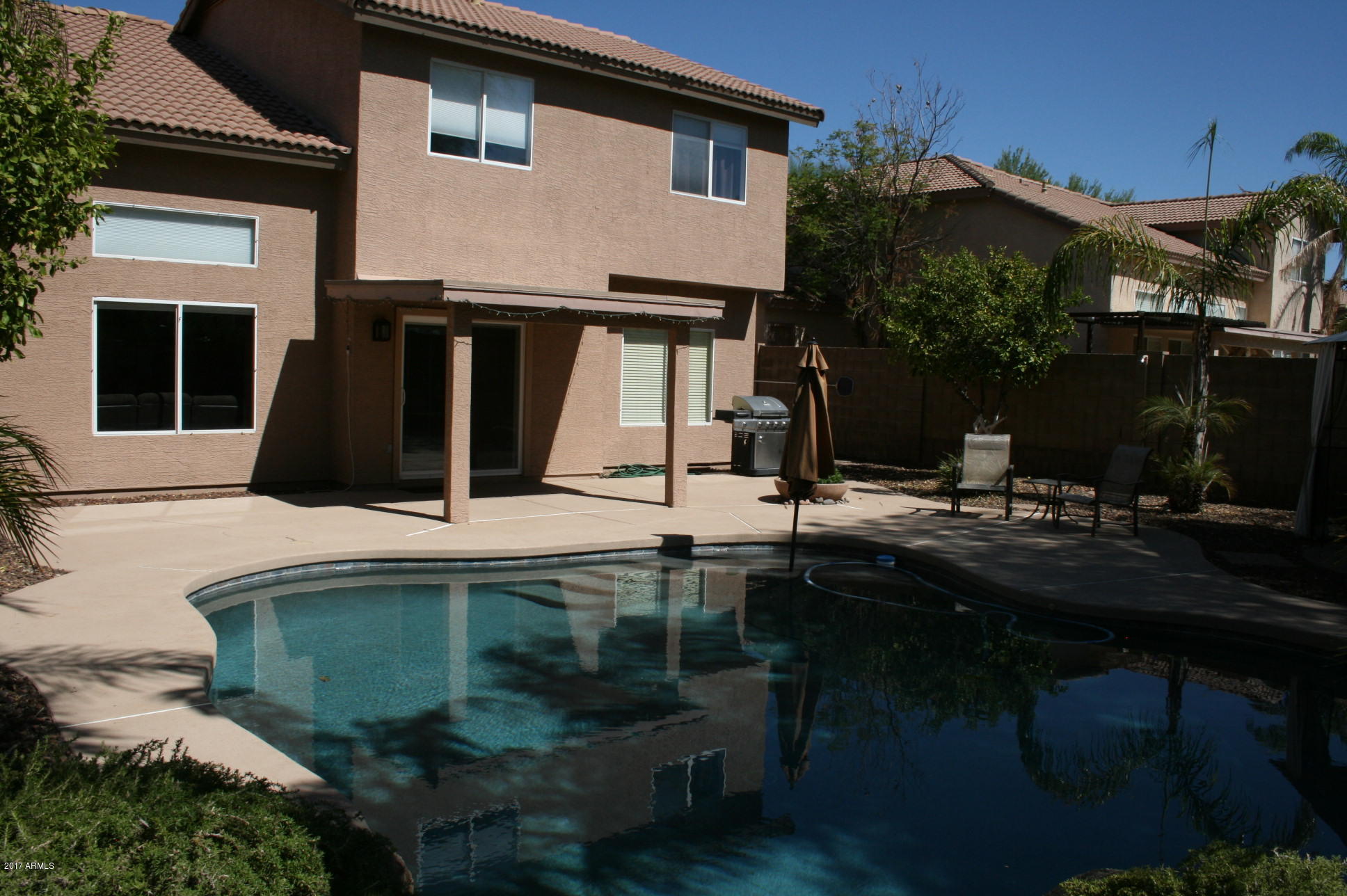 4519 East Rowel Road Phoenix, AZ 85050 - Photo 15 of 28 a view of house with outdoor space