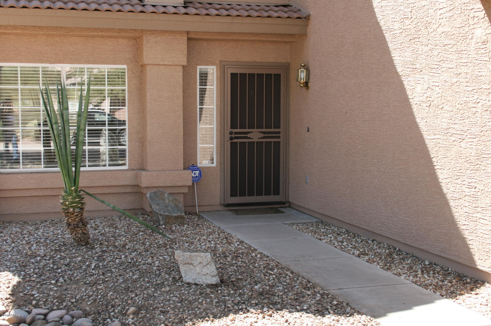 4519 East Rowel Road Phoenix, AZ 85050 - Photo 2 of 28 a front view of a house with a yard