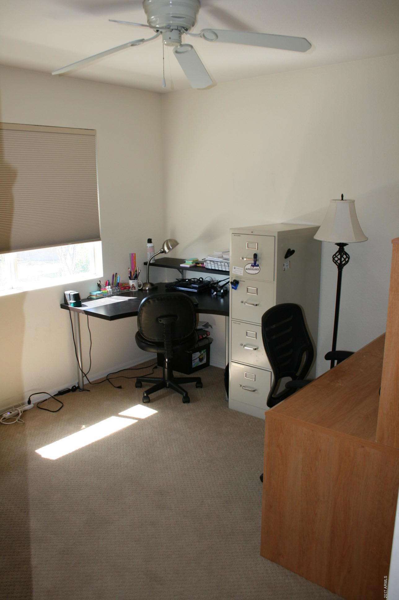 4519 East Rowel Road Phoenix, AZ 85050 - Photo 26 of 28 a room with furniture and a piano