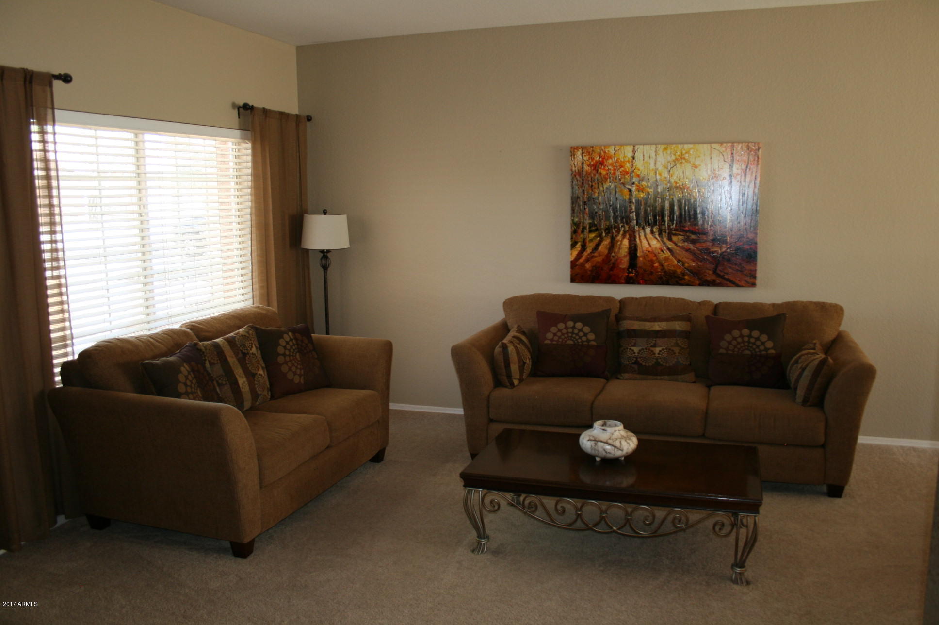 4519 East Rowel Road Phoenix, AZ 85050 - Photo 3 of 28 a living room with furniture and a window