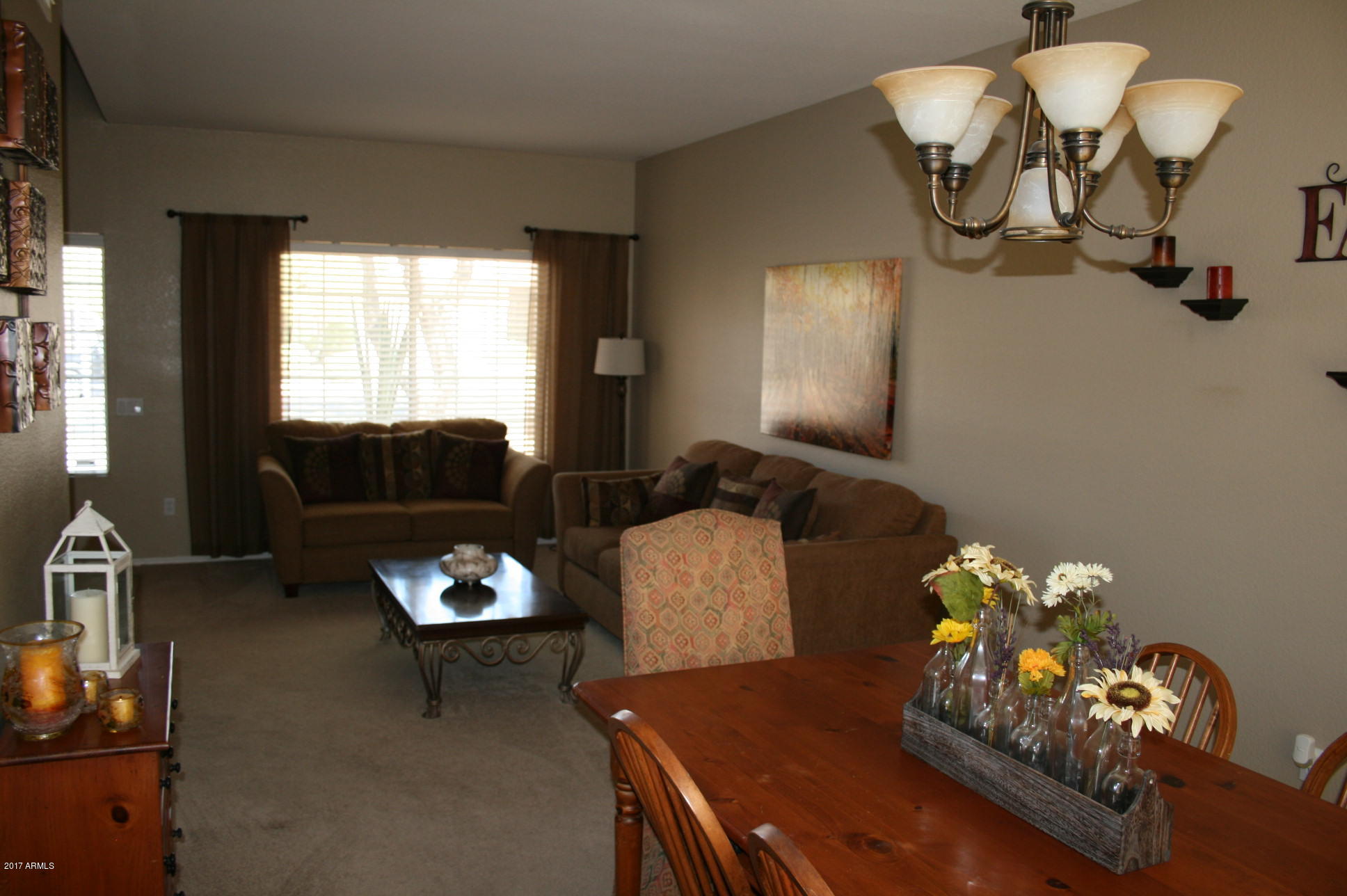 4519 East Rowel Road Phoenix, AZ 85050 - Photo 5 of 28 a living room with furniture flowerpot and window