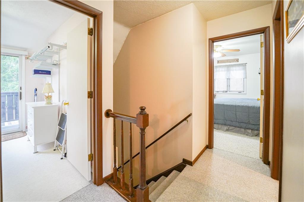 809 Enterprise Road Grove City, PA 16127 - Photo 32 of 43 a view of a livingroom from a hallway