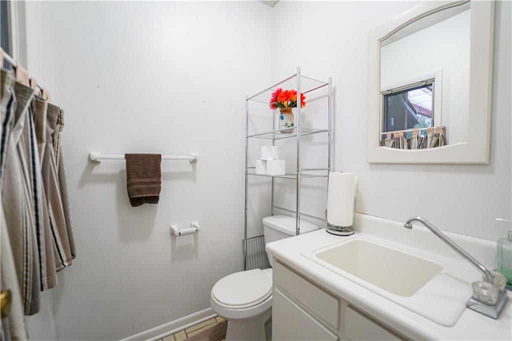 809 Enterprise Road Grove City, PA 16127 - Photo 39 of 43 a bathroom with a sink and a mirror