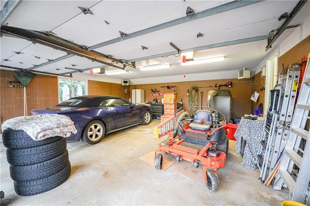 809 Enterprise Road Grove City, PA 16127 - Photo 40 of 43 a view of a garage with furniture