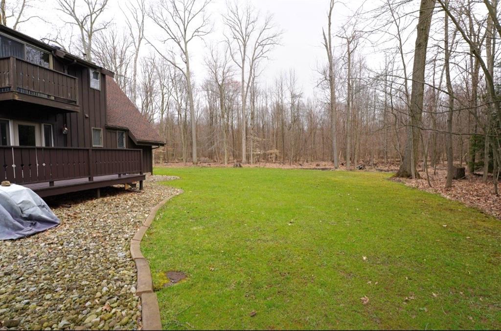 809 Enterprise Road Grove City, PA 16127 - Photo 9 of 43 a backyard of a house with lots of green space