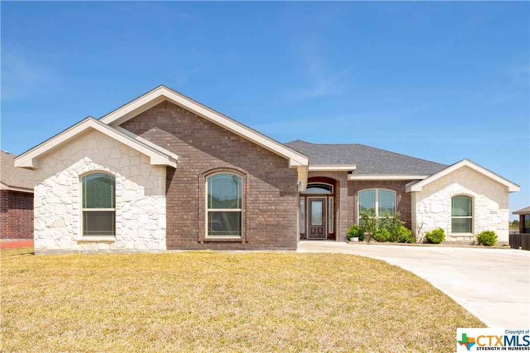 a front view of a house with a outdoor space