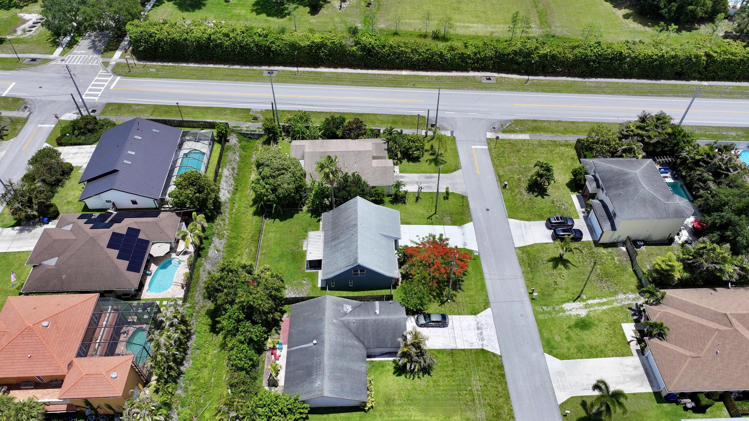 6048 Garrett Street Jupiter, FL 33458 - Photo 93 of 101 dji_fly_20260522_125036_0947_17794718996