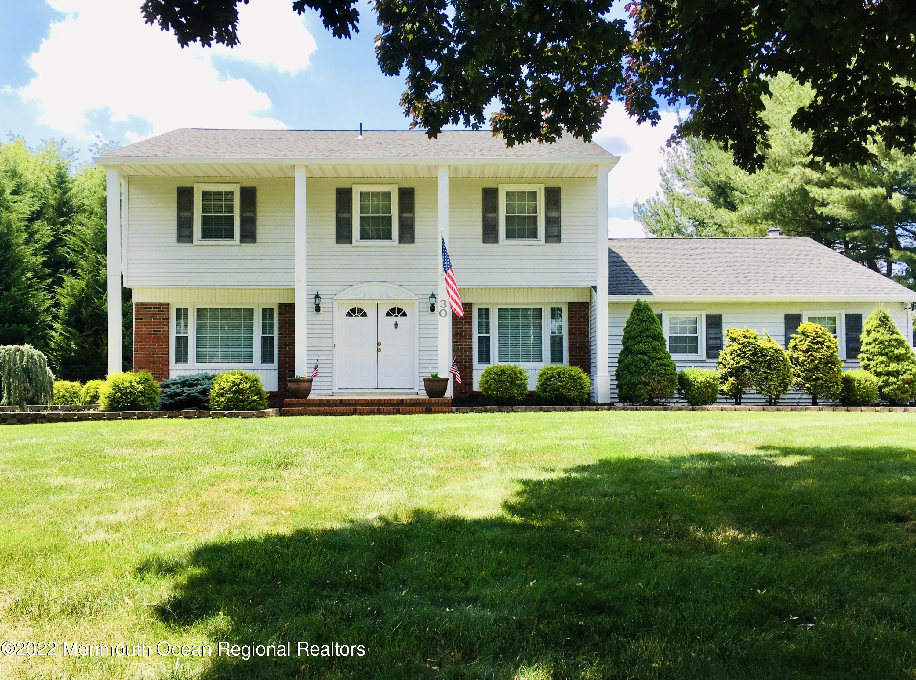 30 Homestead Road Freehold, NJ 07728 - Photo 1 of 42 a front view of a house with a yard