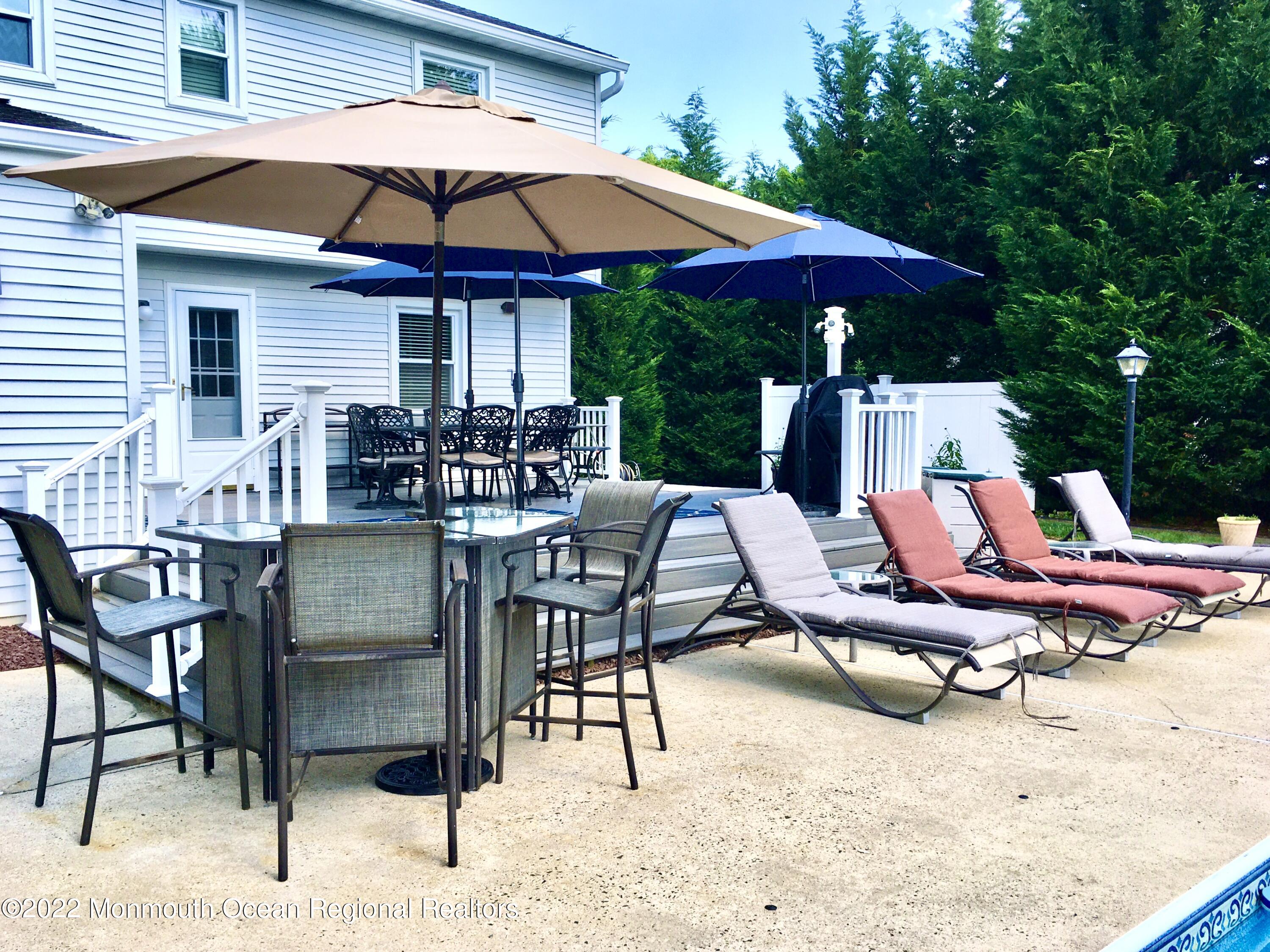 30 Homestead Road Freehold, NJ 07728 - Photo 8 of 42 a view of backyard with outdoor seating