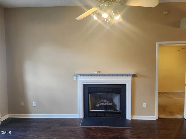 a living room with a fireplace