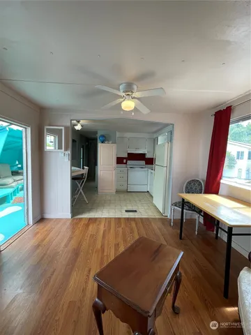 a room with furniture pool table table tennis pool table and windows