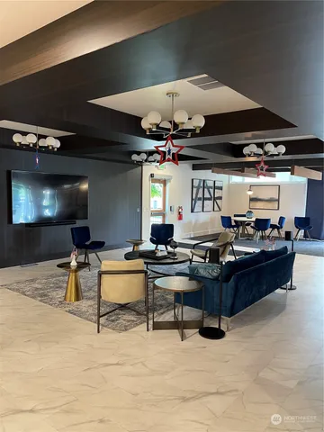 a outdoor kitchen with a sink and stove