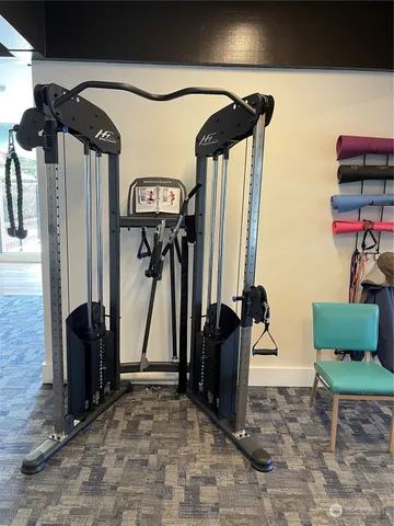 a reading room with furniture and book shelf