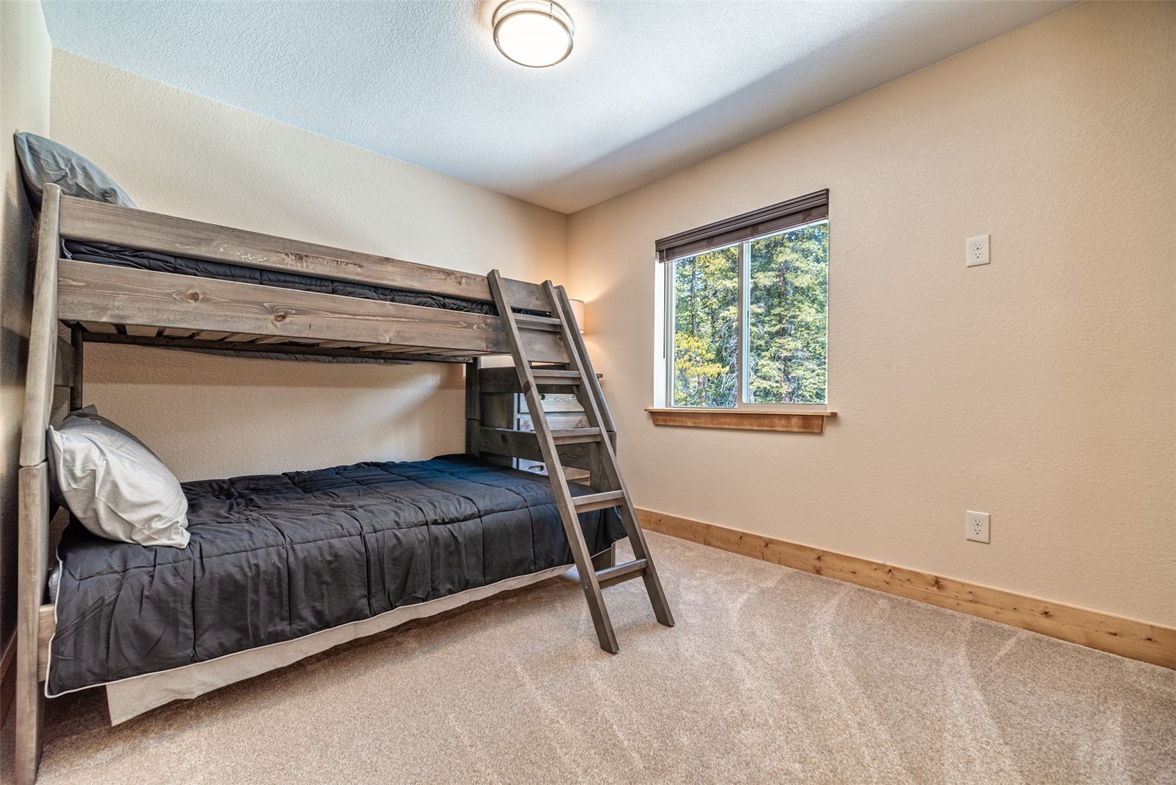 526 Porcupine Road Fairplay, CO 80440 - Photo 27 of 45 a bedroom with a bed and a window