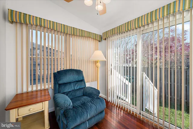 a workspace with furniture and a window