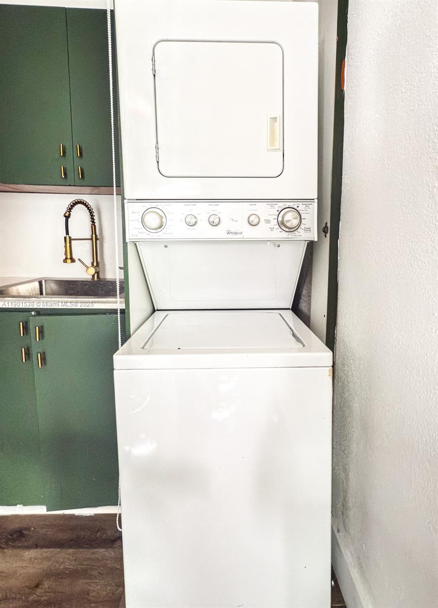 7928 Harding Avenue, Unit 2 Miami Beach, FL 33141 - Photo 6 of 19 a utility room with dryer and washer