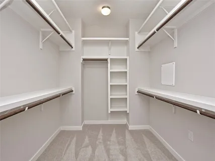 a bathroom with a double vanity sink mirror and
