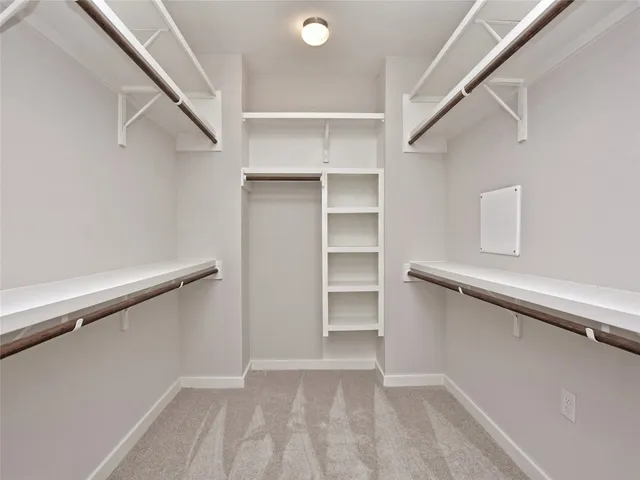 a bathroom with a double vanity sink mirror and