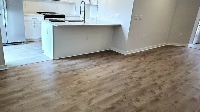 a view of a kitchen with a sink