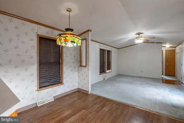 a view of a room with a chandelier
