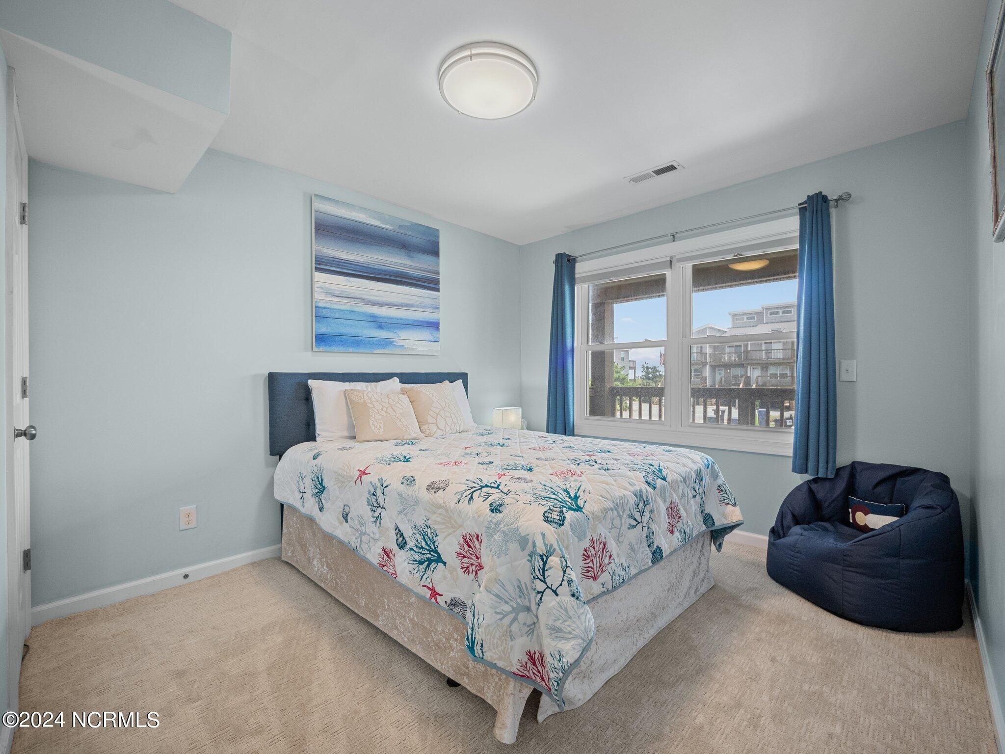 1771 New River Inlet Road, Unit 1 North Topsail Beach, NC 28460 - Photo 20 of 49 Oceanside Bedroom