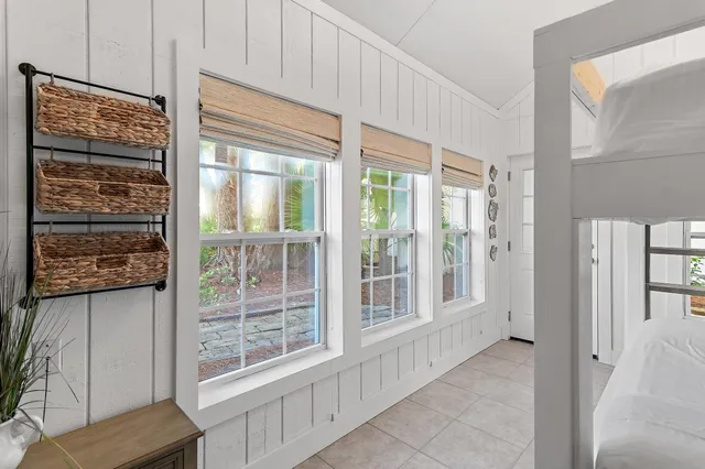 a view of a walk in closet with empty racks