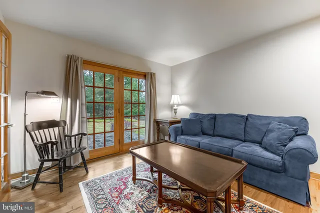 a large spacious bathroom with a large tub and sink