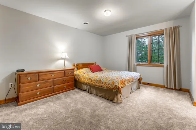 a view of a kitchen with a sink and a stove top oven