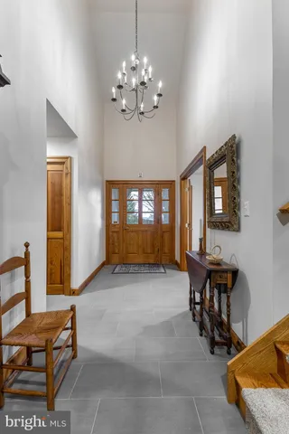 a view of a livingroom with furniture and window