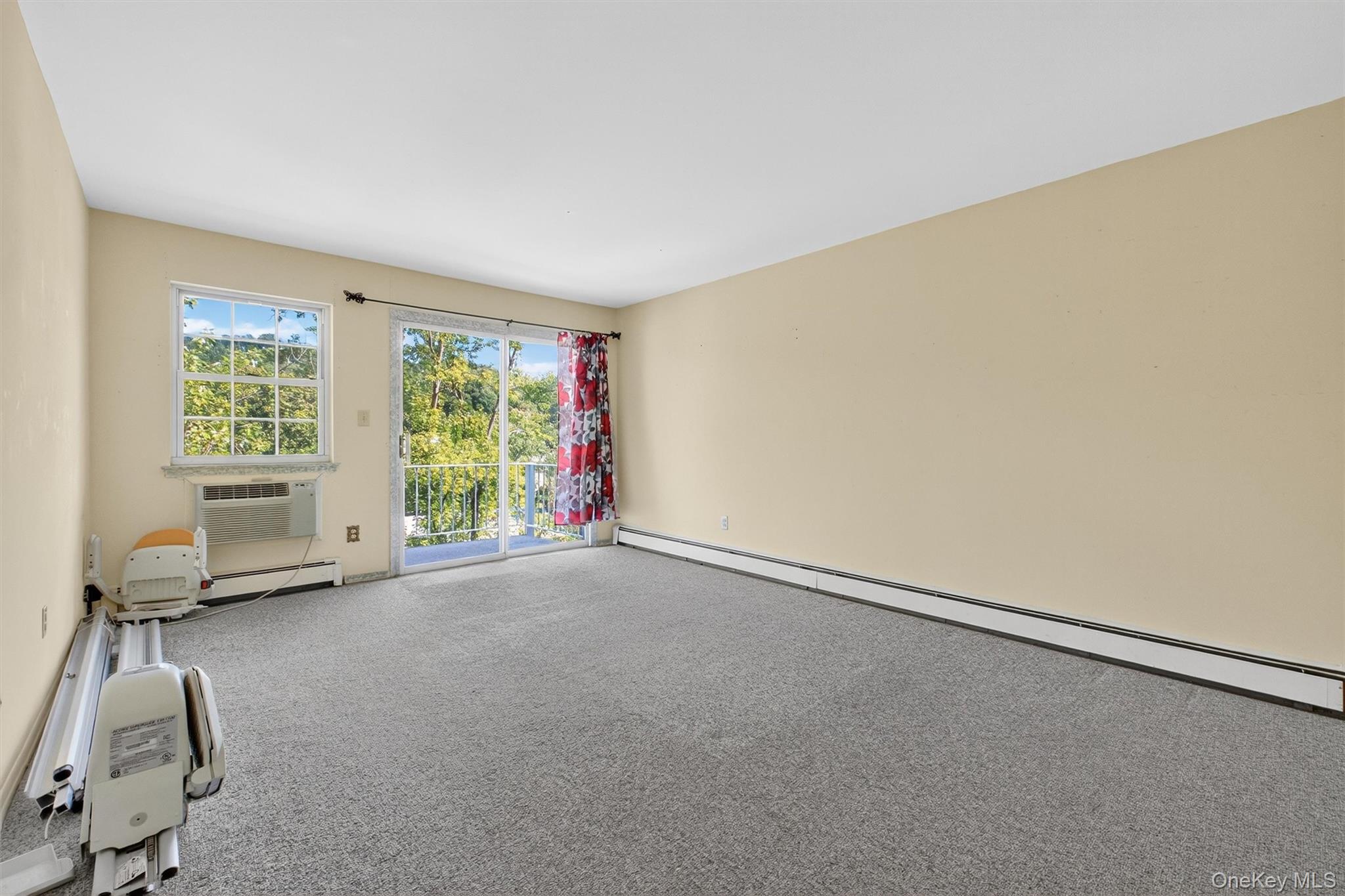 1840 Crompond Road, Unit 5C8 Peekskill, NY 10566 - Photo 14 of 36 a view of a room with gym equipment and a window