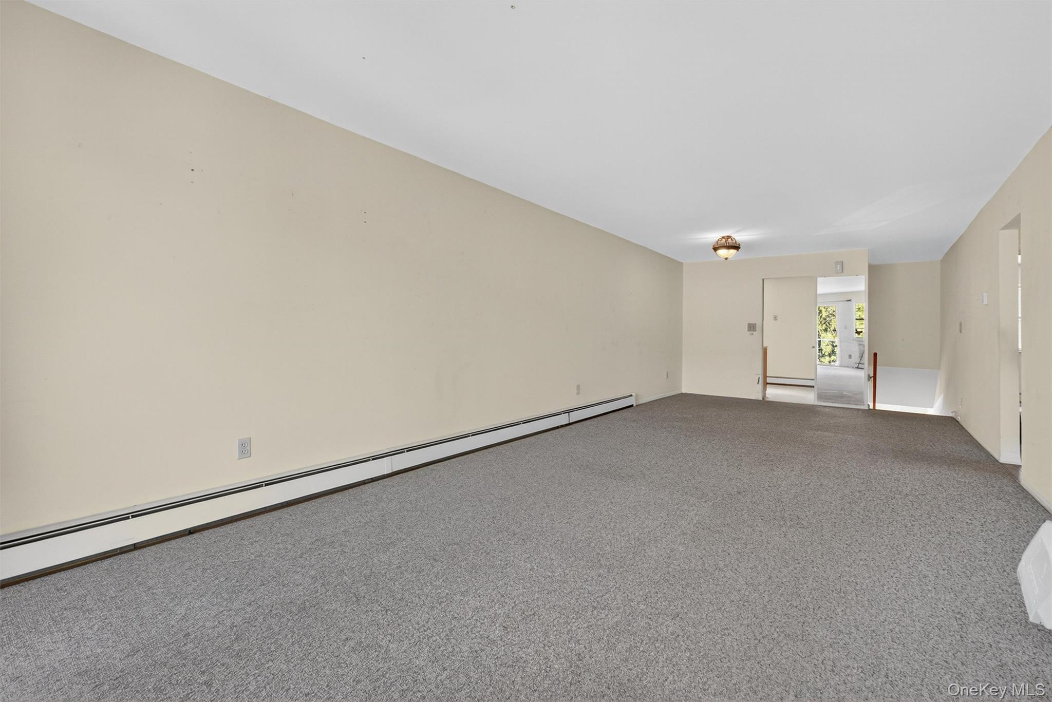 1840 Crompond Road, Unit 5C8 Peekskill, NY 10566 - Photo 15 of 36 an empty room with natural light