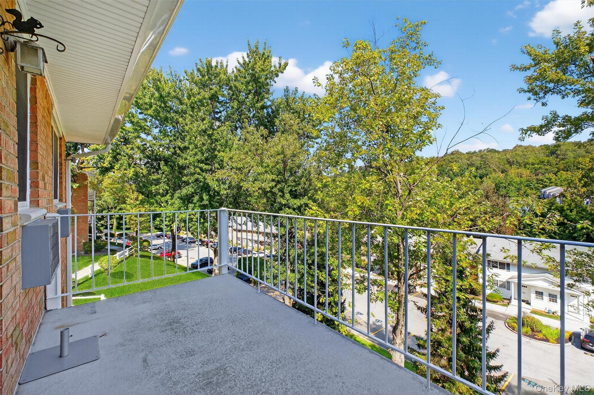 1840 Crompond Road, Unit 5C8 Peekskill, NY 10566 - Photo 26 of 36 a view of a pathway with a garden