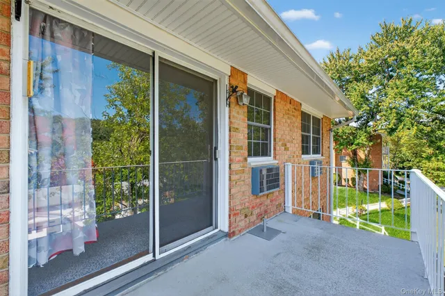 a view of a building with a yard