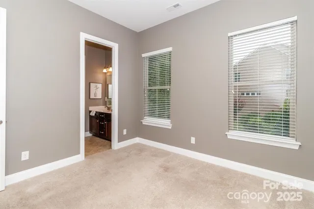 a view of a room with a large window