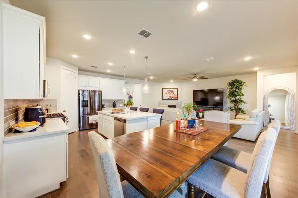 a view of a dining room with furniture