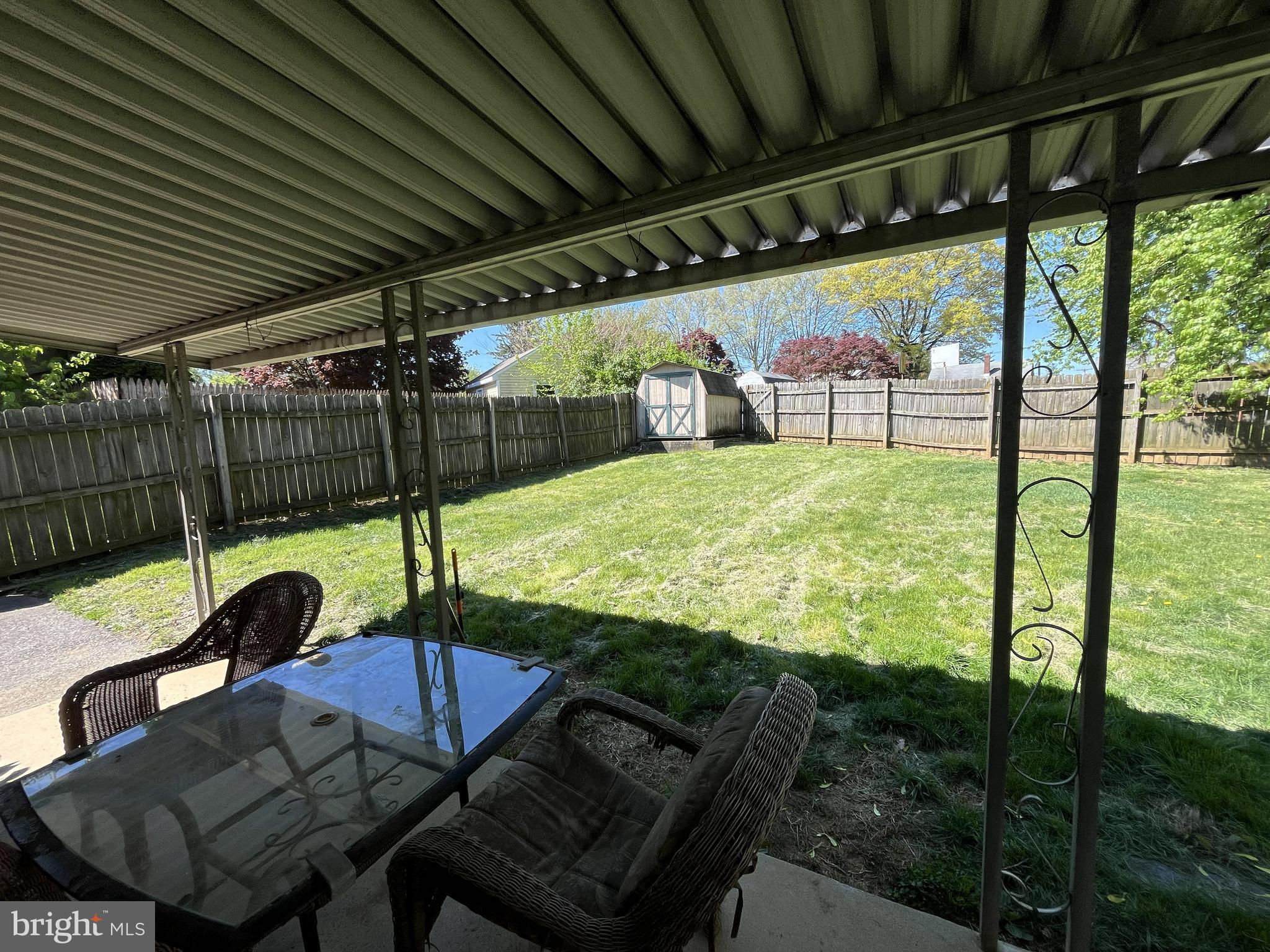 931 Kreider Street Lebanon, PA 17042 - Photo 17 of 18 a view of a patio with table and chairs with wooden floor and fence