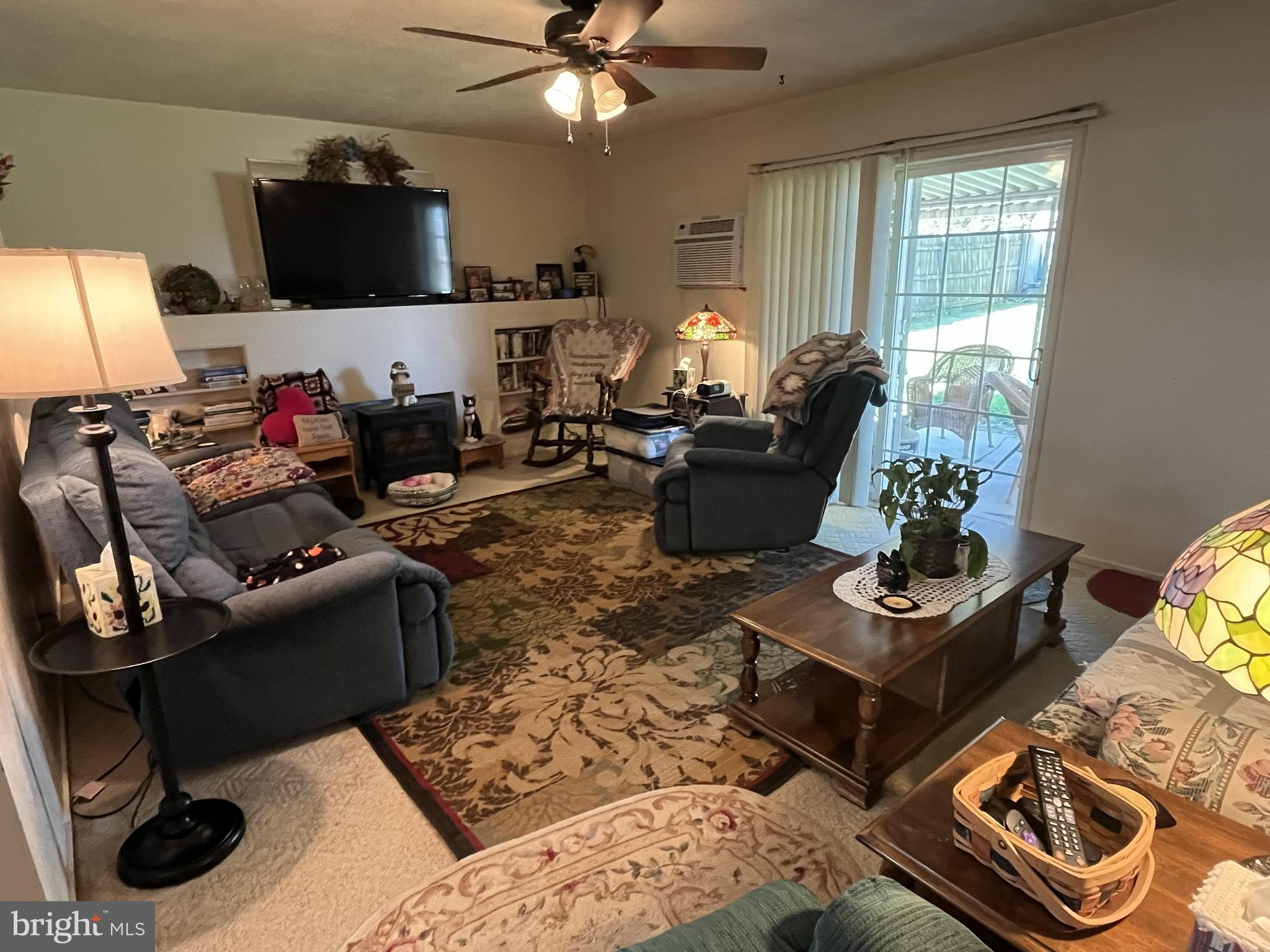 931 Kreider Street Lebanon, PA 17042 - Photo 2 of 18 a living room with furniture and a flat screen tv