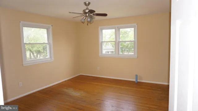 a bathroom with a toilet and a bathtub