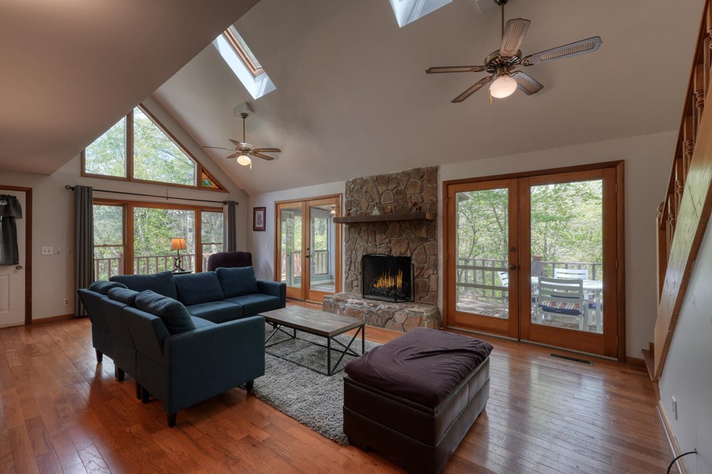 30 Beaver Ridge Road Murphy, NC 28906 - Photo 4 of 40 a living room with furniture and a fireplace