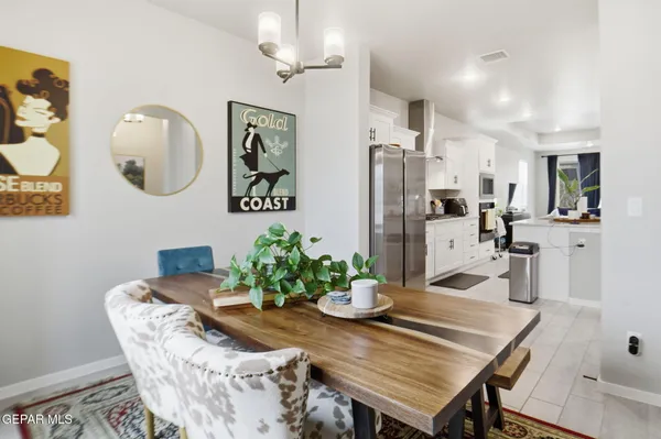 a view of a dining room with furniture