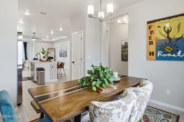 a kitchen with stainless steel appliances kitchen island granite countertop a sink and cabinets