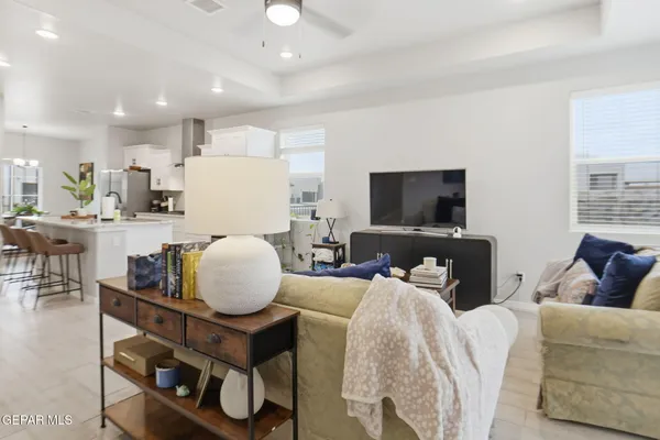 a bedroom with a bed and a night stand