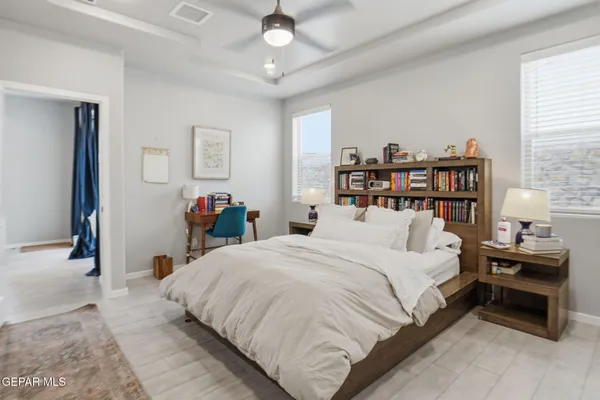a bathroom with a tub and a window