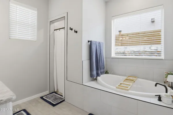 a bathroom with a sink a toilet and a bathtub