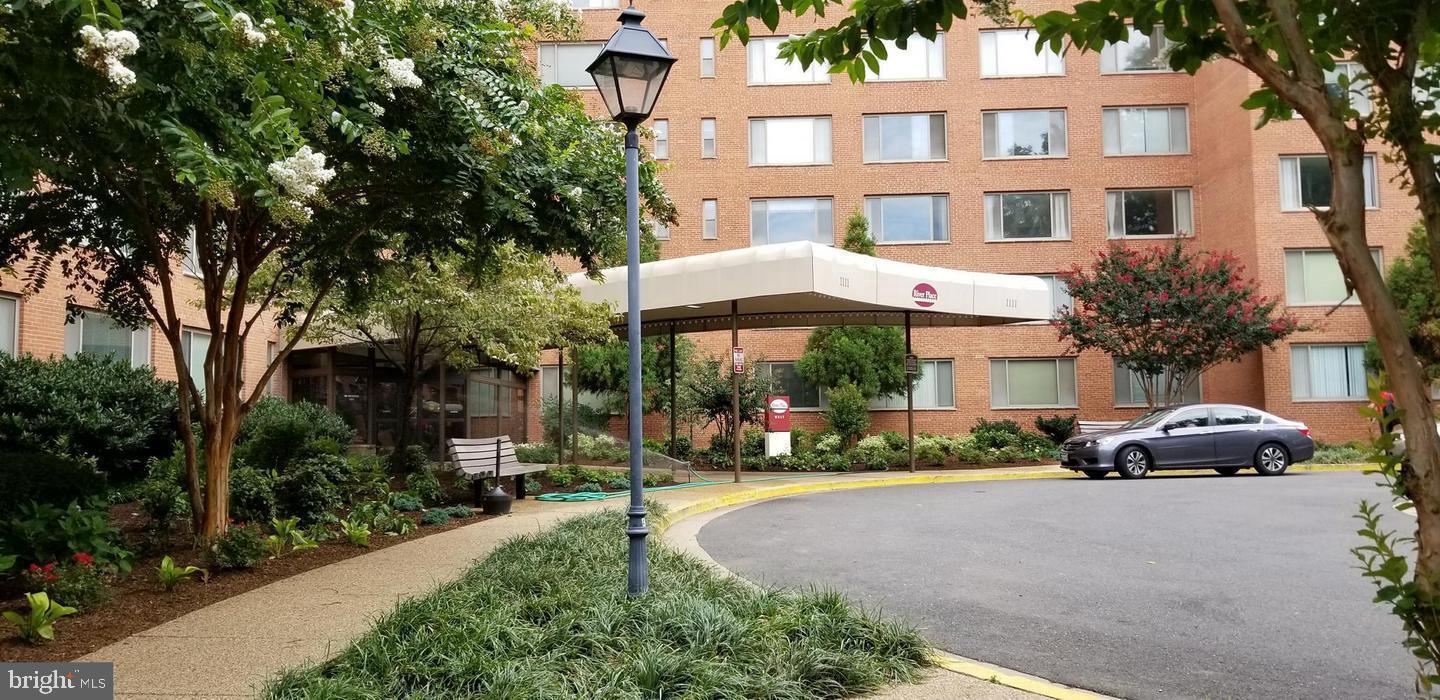 1111 Arlington Boulevard, Unit 738 Arlington, VA 22209 - Photo 2 of 37 a front view of a building with street view