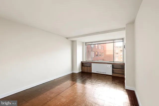 a view of room with air conditioner and window