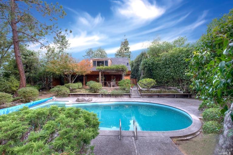 73 Reed Ranch Road Tiburon, CA 94920 - Photo 1 of 1 a house view with swimming pool and garden space