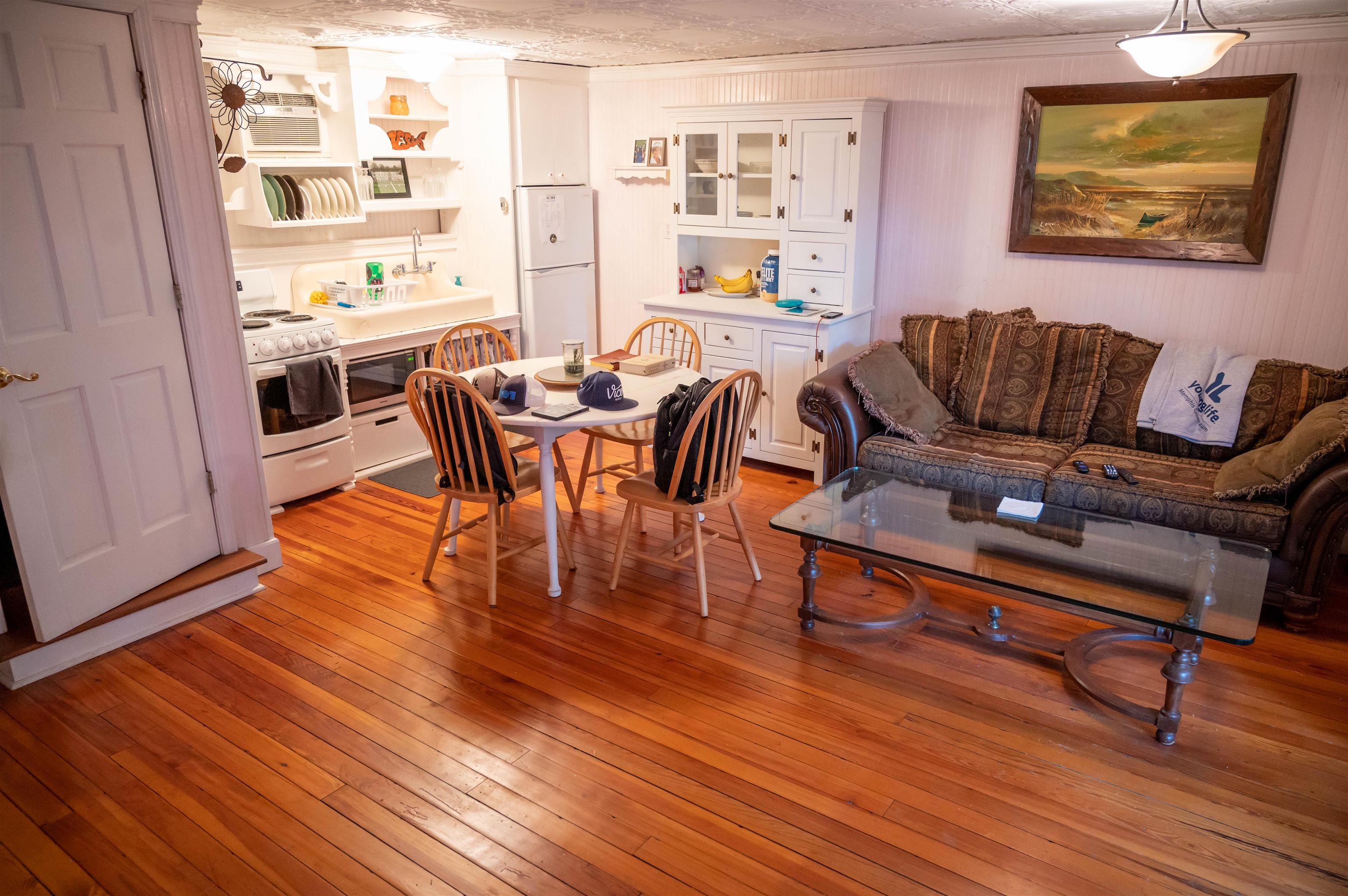 1267 Central Avenue Memphis, TN 38104 - Photo 24 of 25 a view of a dining room with furniture window and wooden floor